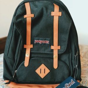 NEW JANSPORT BLACK BACKPACK | leather bottom